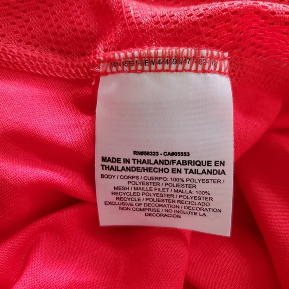 NIKE Dri-Fit Workout T with Mesh Paneling in Melon Red. - Picture 7 of 8